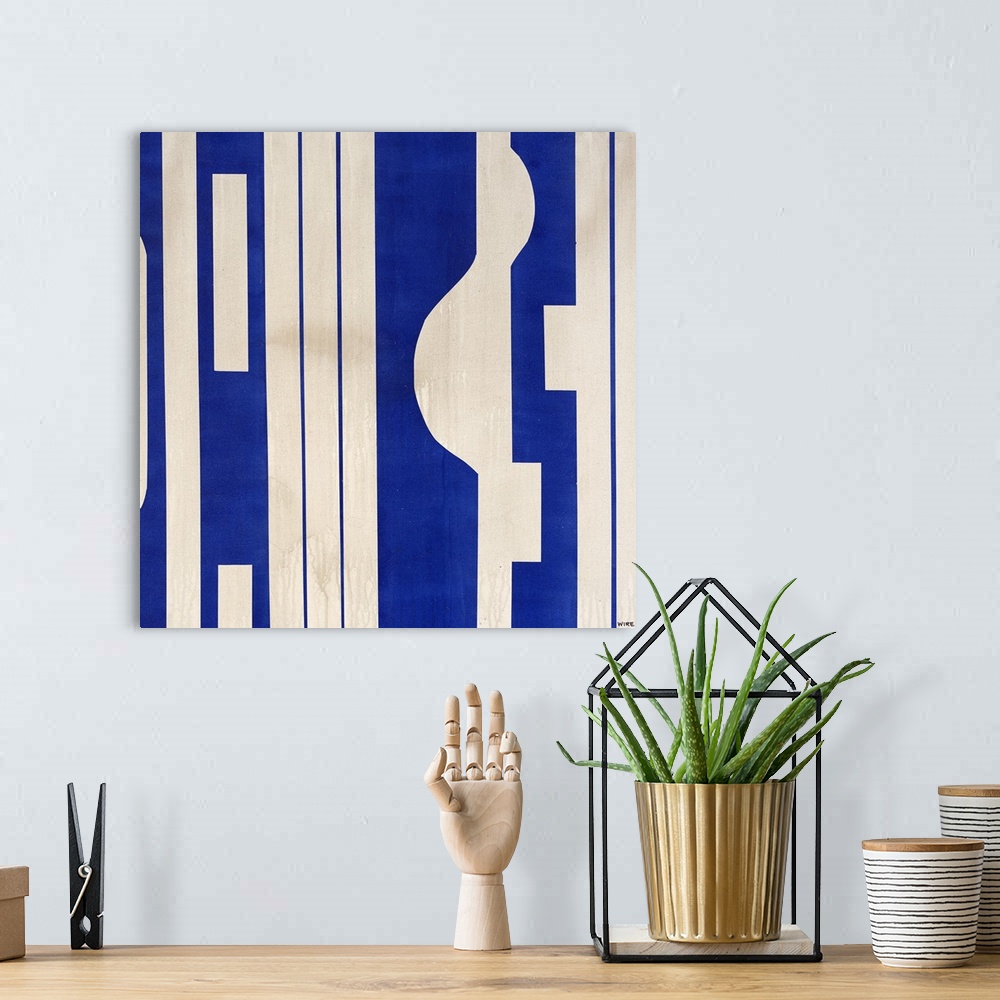 A bohemian room featuring Modern artwork featuring a mixture of blue and light colored shapes.