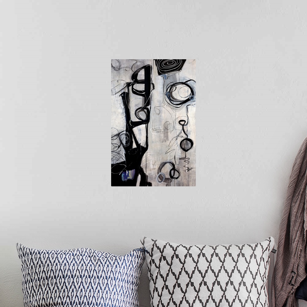 A bohemian room featuring Vertical oversized contemporary artwork of dark swirling circular shapes and scribbles on a strea...
