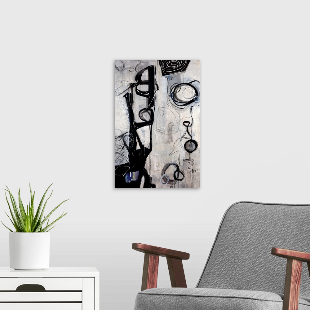 A modern room featuring Vertical oversized contemporary artwork of dark swirling circular shapes and scribbles on a strea...