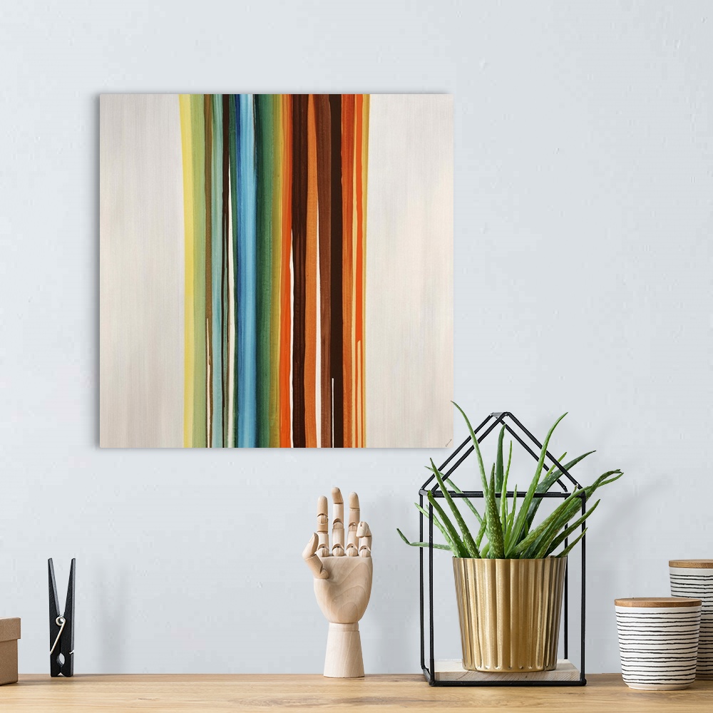 A bohemian room featuring Modern art of a cluster of vertical multicolored stripes that are side by side on a light, neutra...