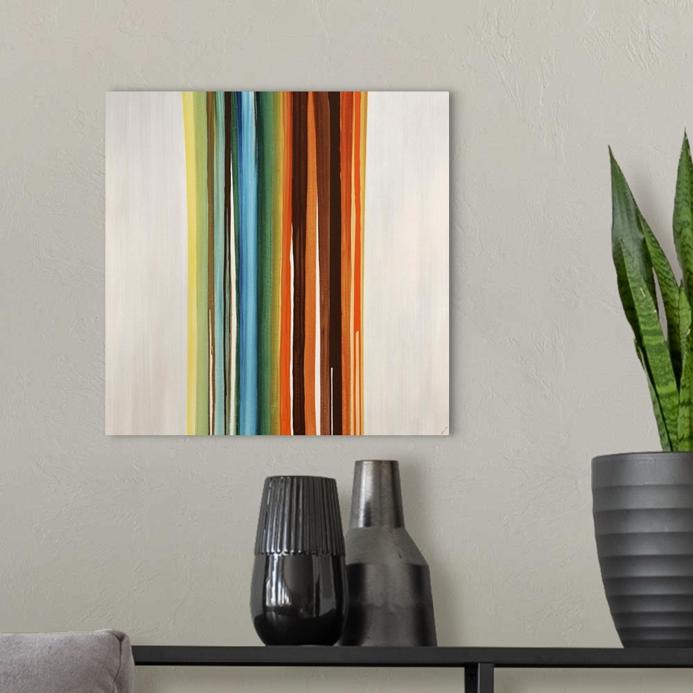 A modern room featuring Modern art of a cluster of vertical multicolored stripes that are side by side on a light, neutra...