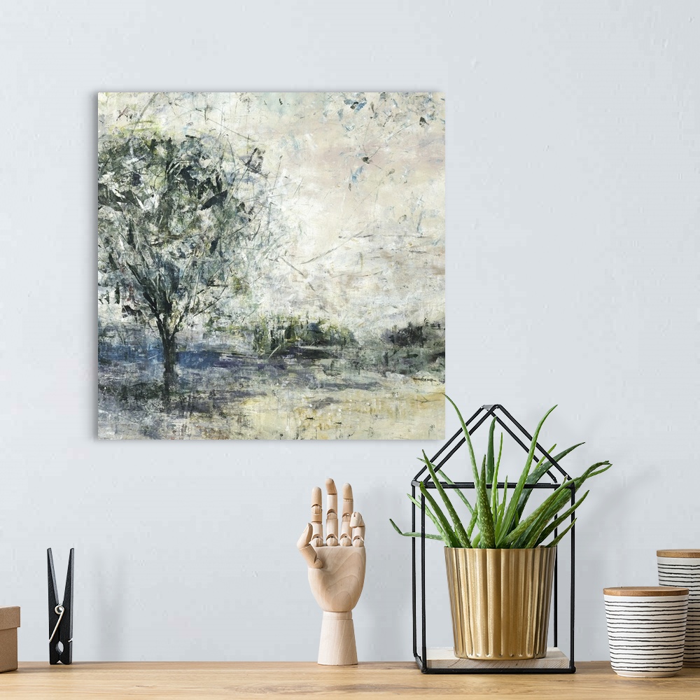 A bohemian room featuring An abstract landscape of a field and tree in textured brush strokes.