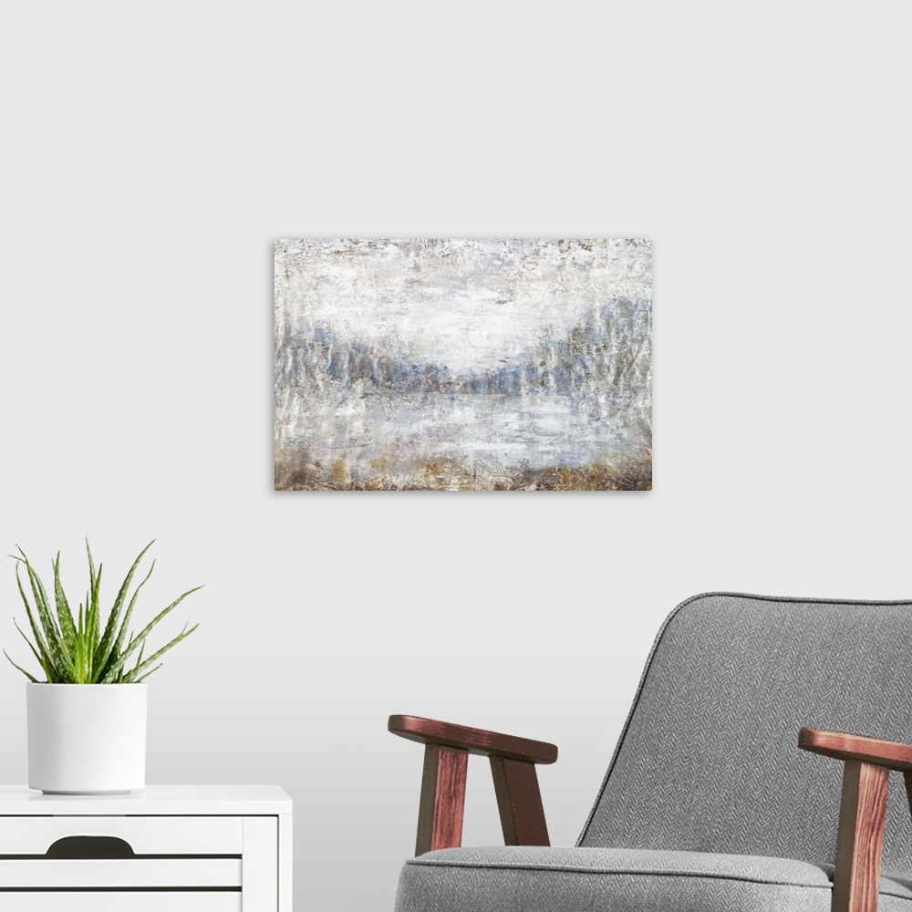 A modern room featuring Rough abstract artwork in shades of blue, gray, and brown.