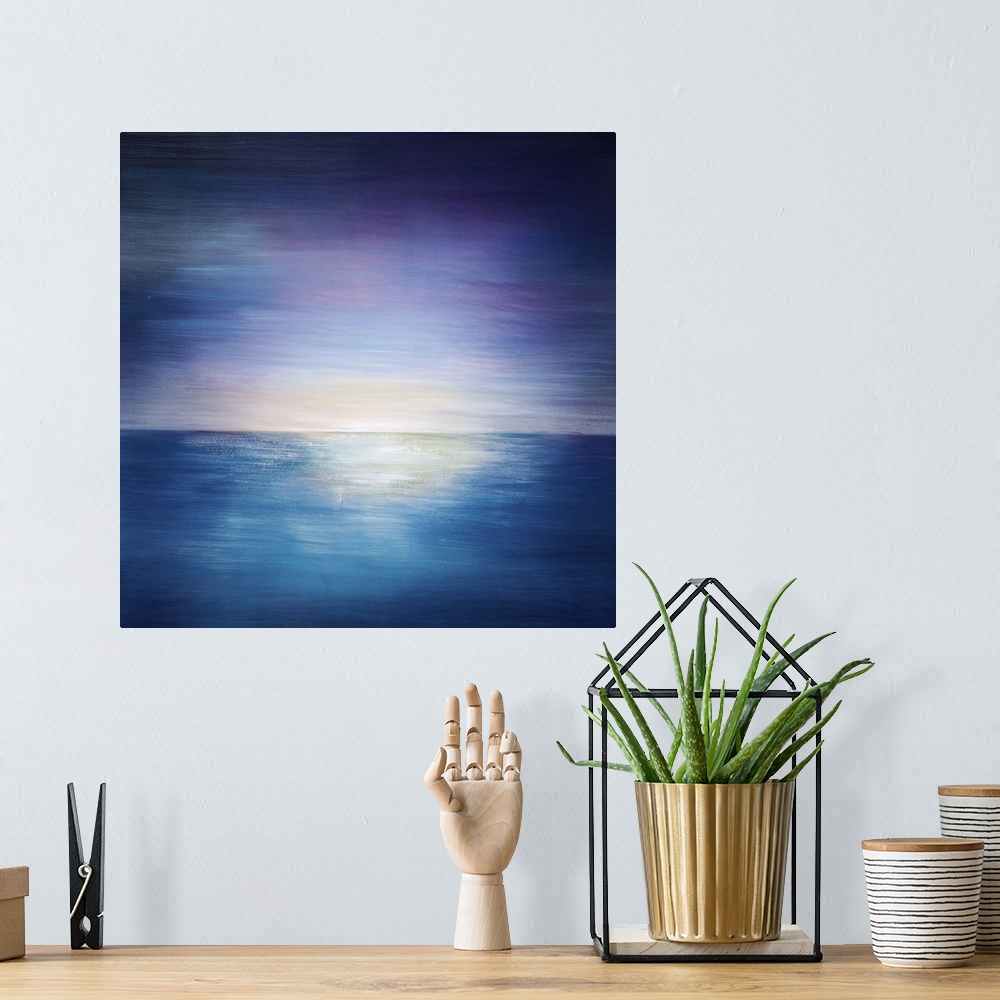 A bohemian room featuring Abstract painting of a vibrant sky as the sun sets on the horizon of a body of water, painted wit...
