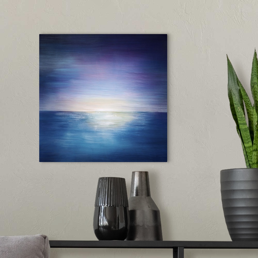 A modern room featuring Abstract painting of a vibrant sky as the sun sets on the horizon of a body of water, painted wit...