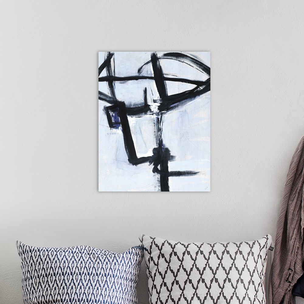 A bohemian room featuring Contemporary abstract artwork with lined movement in black on a light blue background.