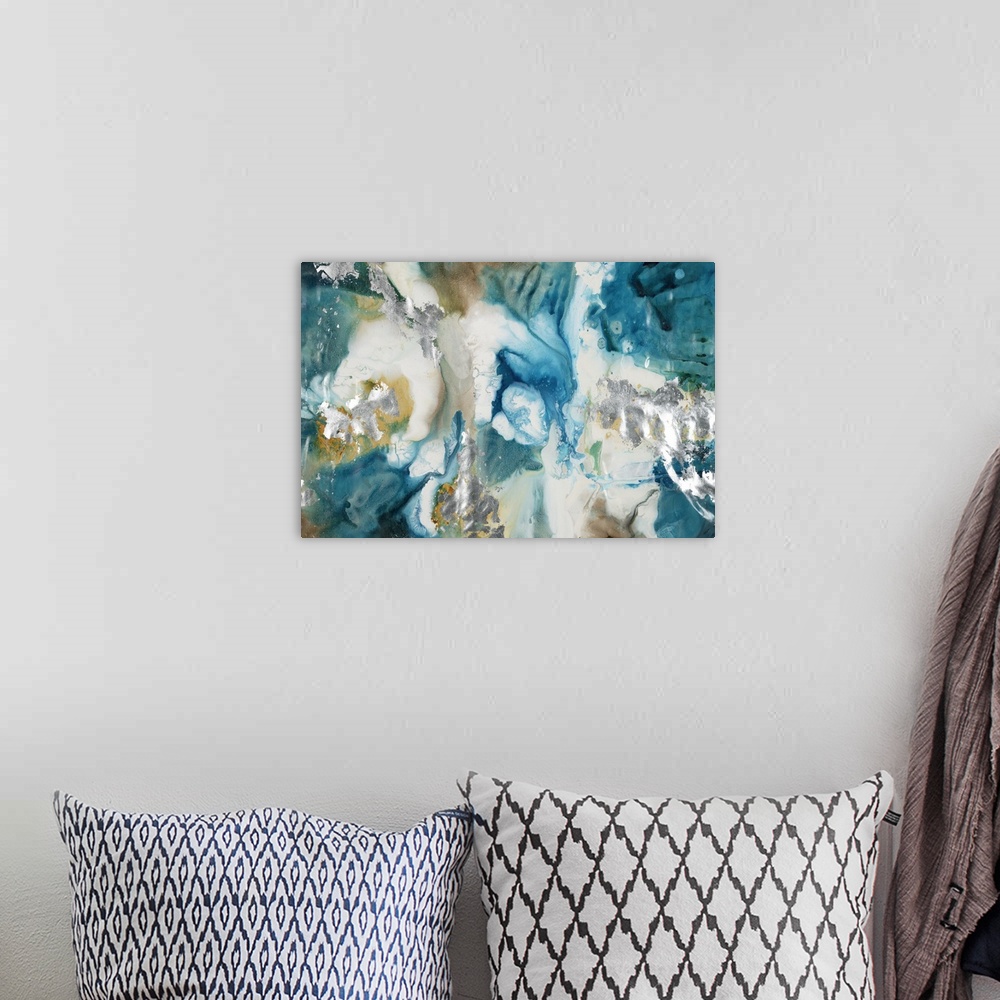 A bohemian room featuring Large abstract painting with marbled colors in shades of blue, brown, silver, gold, and white.