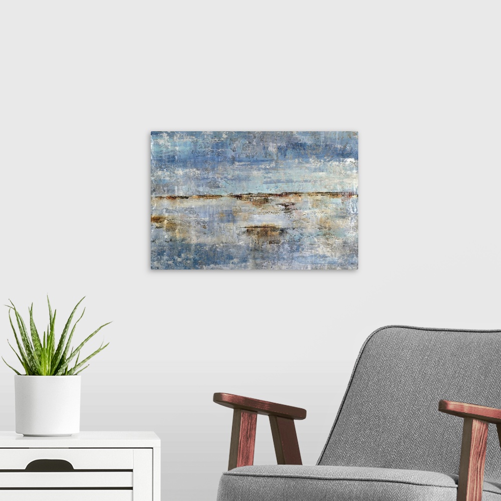 A modern room featuring Rough abstract artwork in shades of blue and brown.