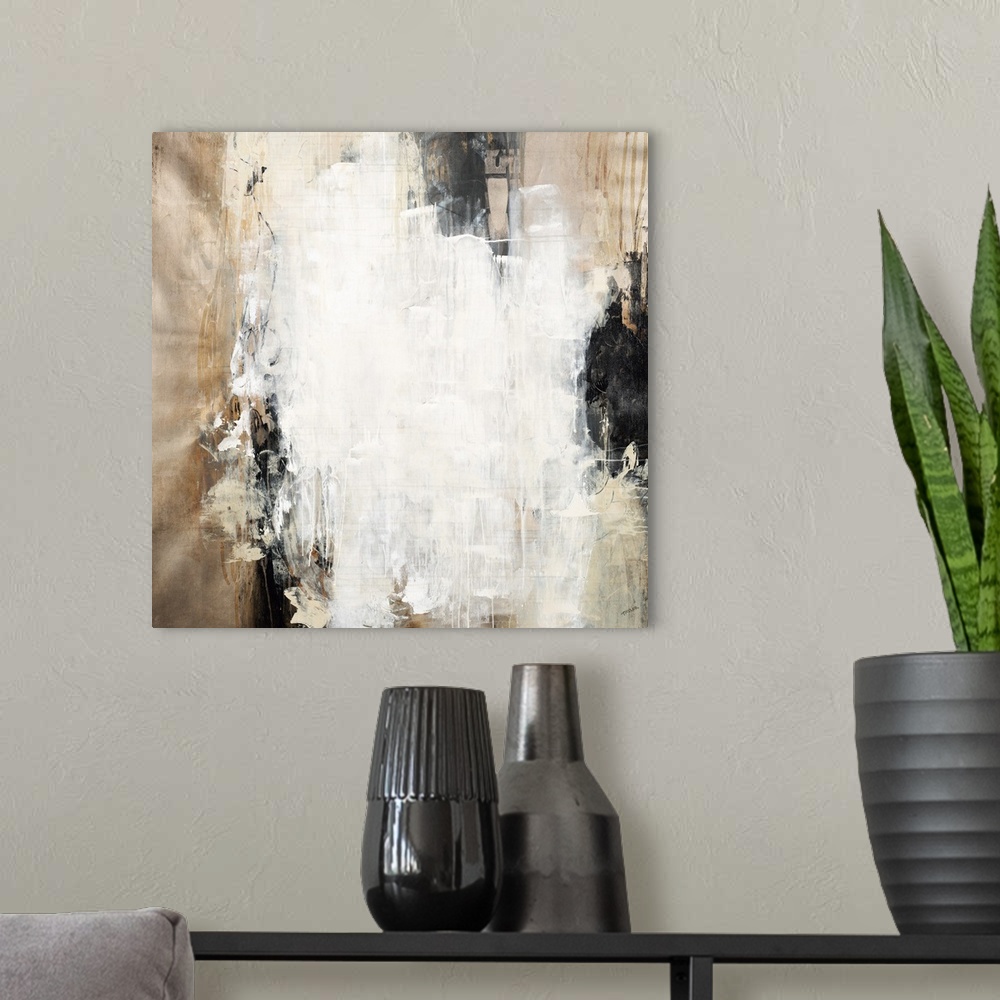 A modern room featuring Contemporary abstract artwork in black and brown shades with bright white in the center.