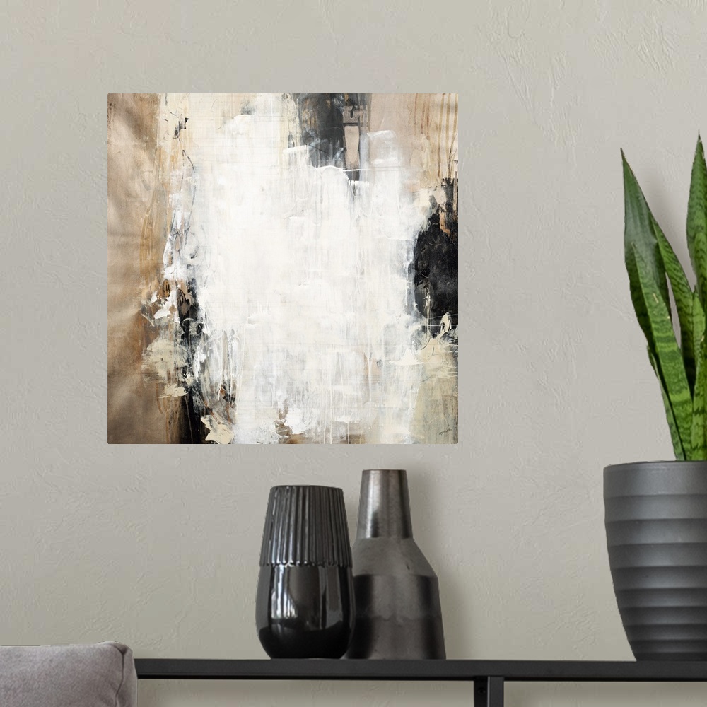 A modern room featuring Contemporary abstract artwork in black and brown shades with bright white in the center.