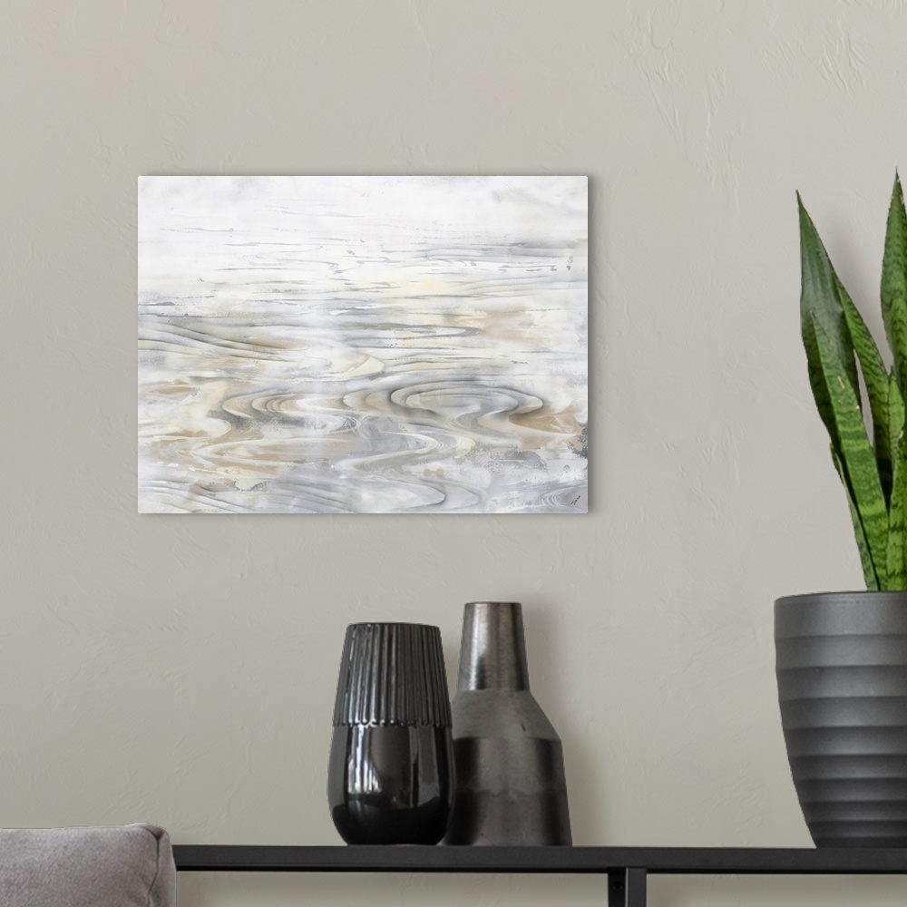 A modern room featuring Contemporary artwork of faint ripples in a body of water in tones of gray and brown.