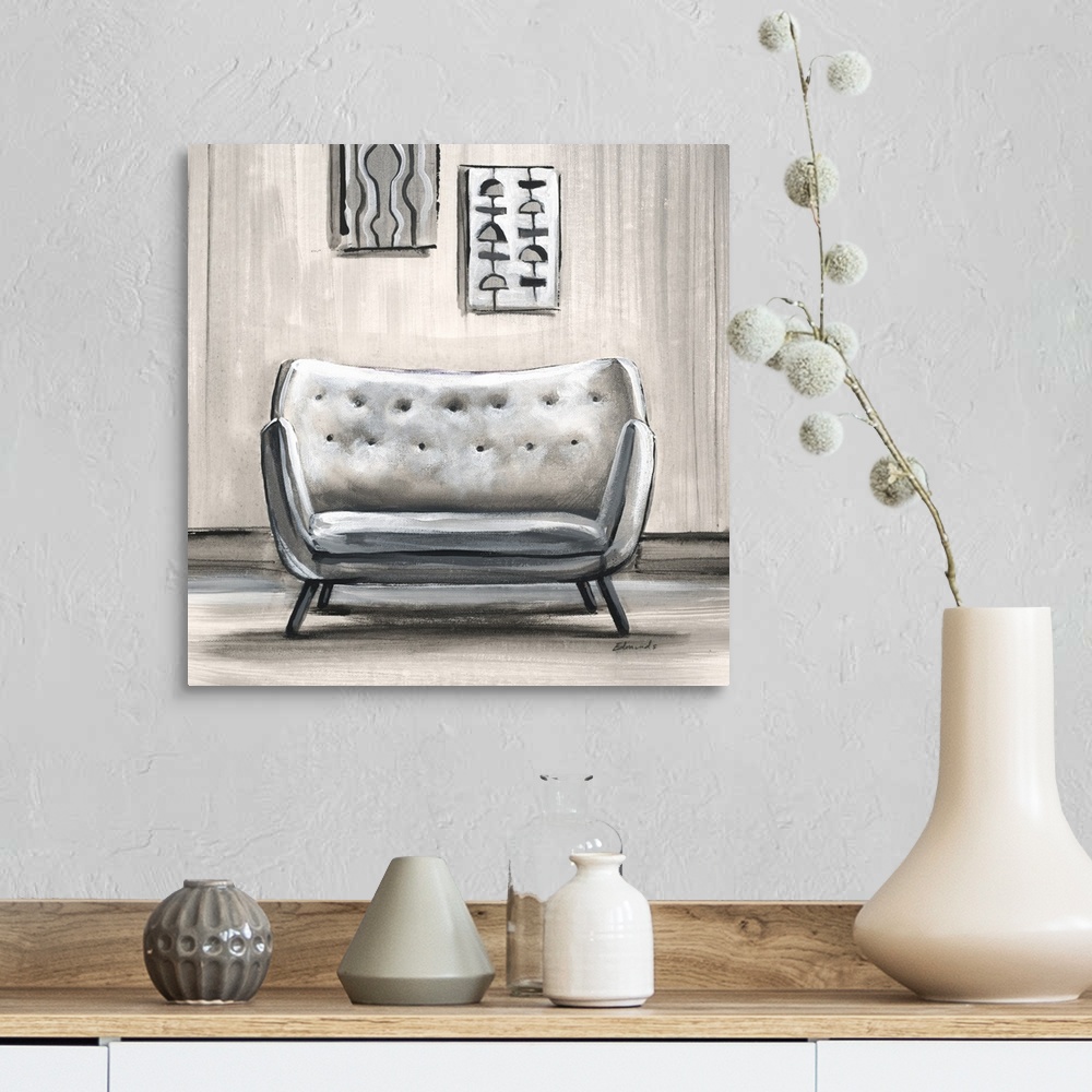 A farmhouse room featuring Contemporary artwork of a stylish chair in a home with mid century decor.