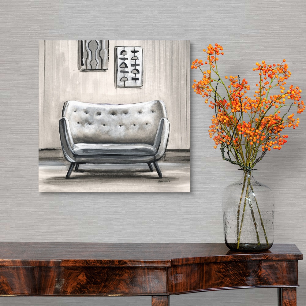 A traditional room featuring Contemporary artwork of a stylish chair in a home with mid century decor.