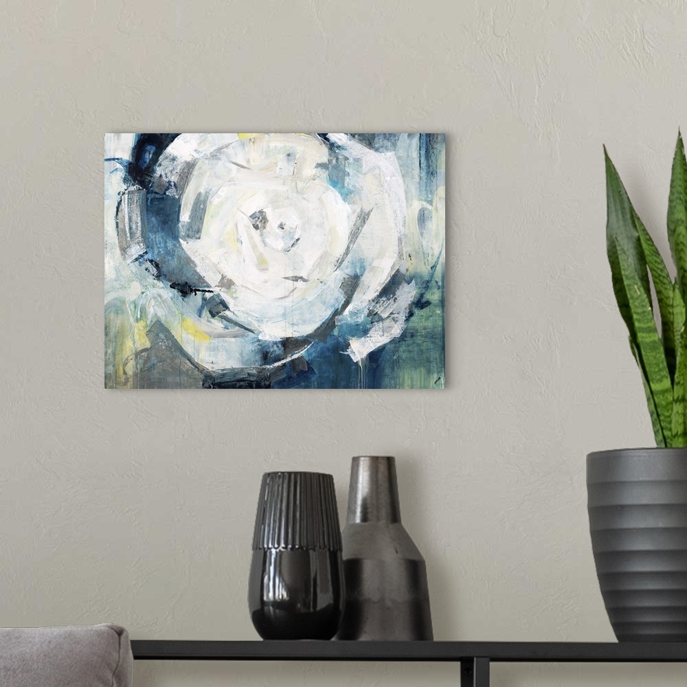 A modern room featuring Contemporary abstract painting in shades of blue and gold, swirling around a white center.