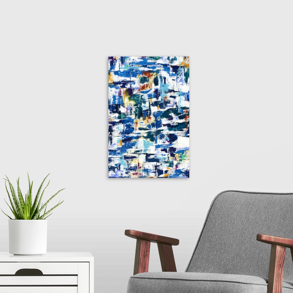 A modern room featuring Large abstract artwork with busy brushstrokes in shades of blue, yellow, orange, green, and red.