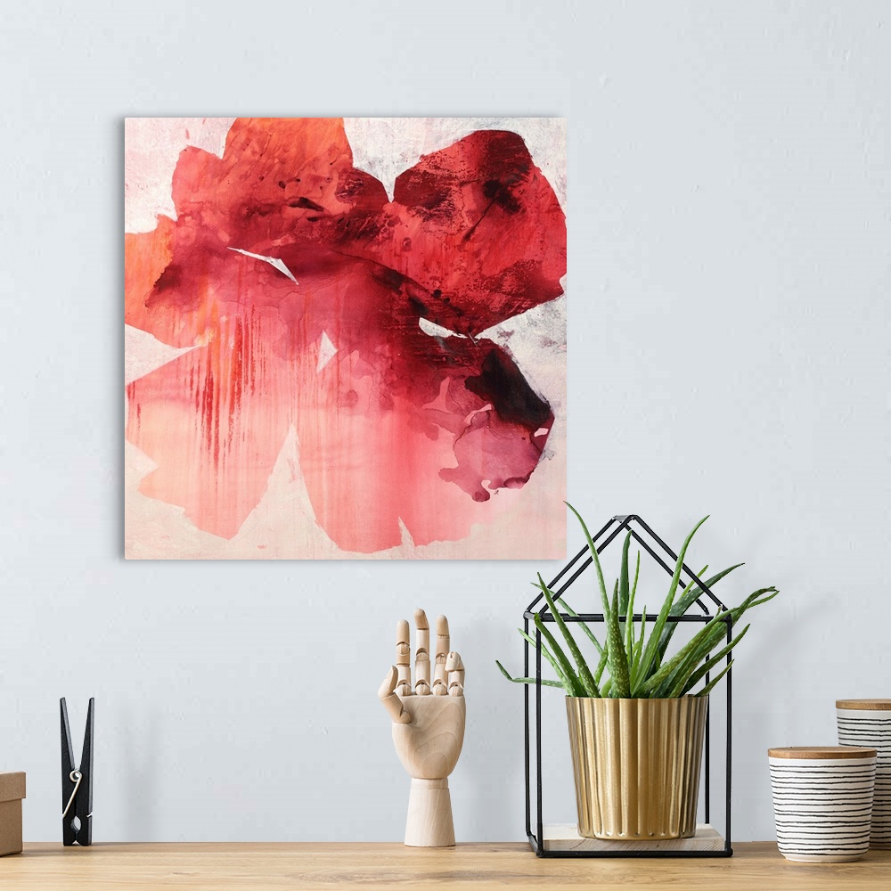 A bohemian room featuring Square abstract painting of a large tropical flower in shades of red.