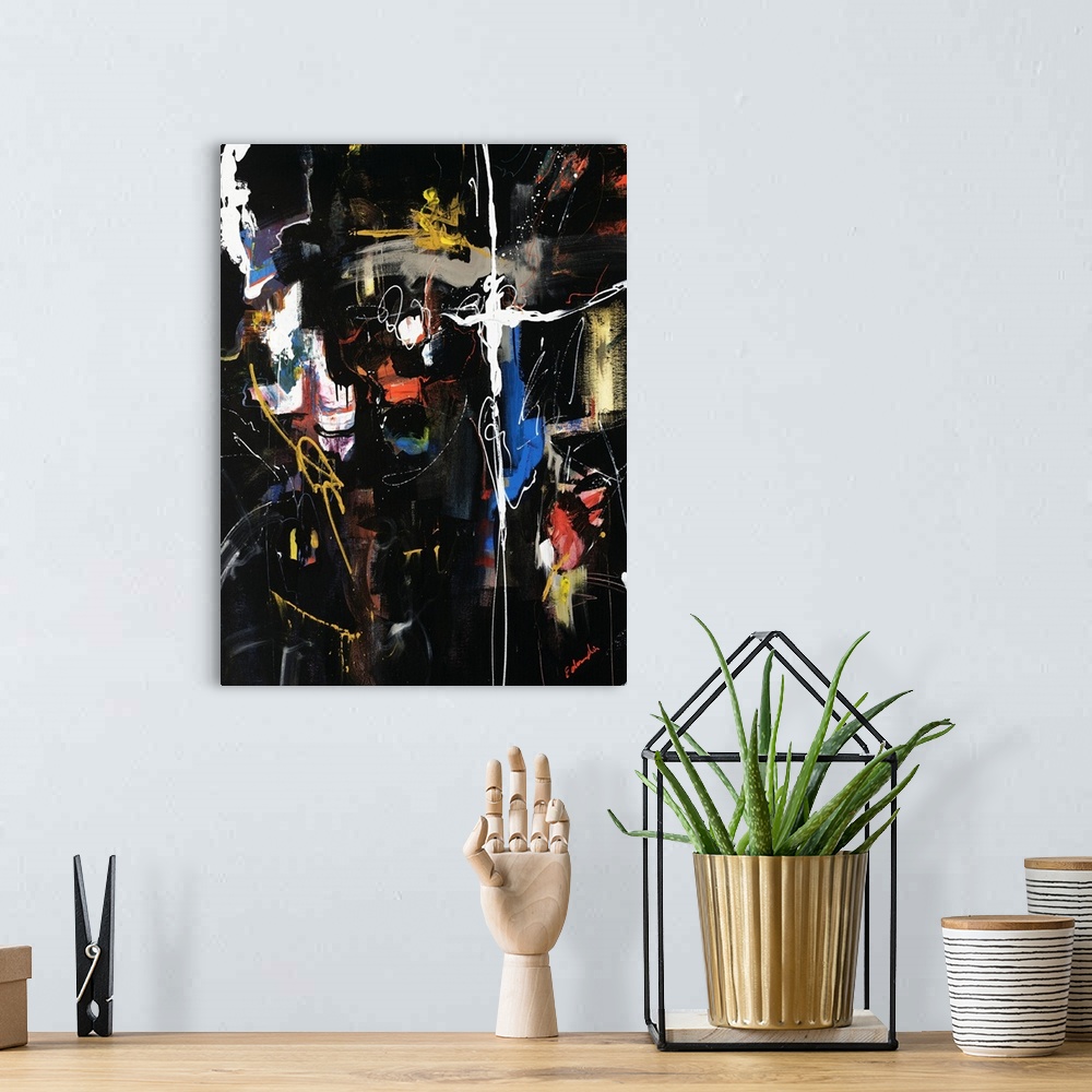 A bohemian room featuring Portrait, abstract painting on a large wall hanging of splatters, squiggly lines, brush marks and...