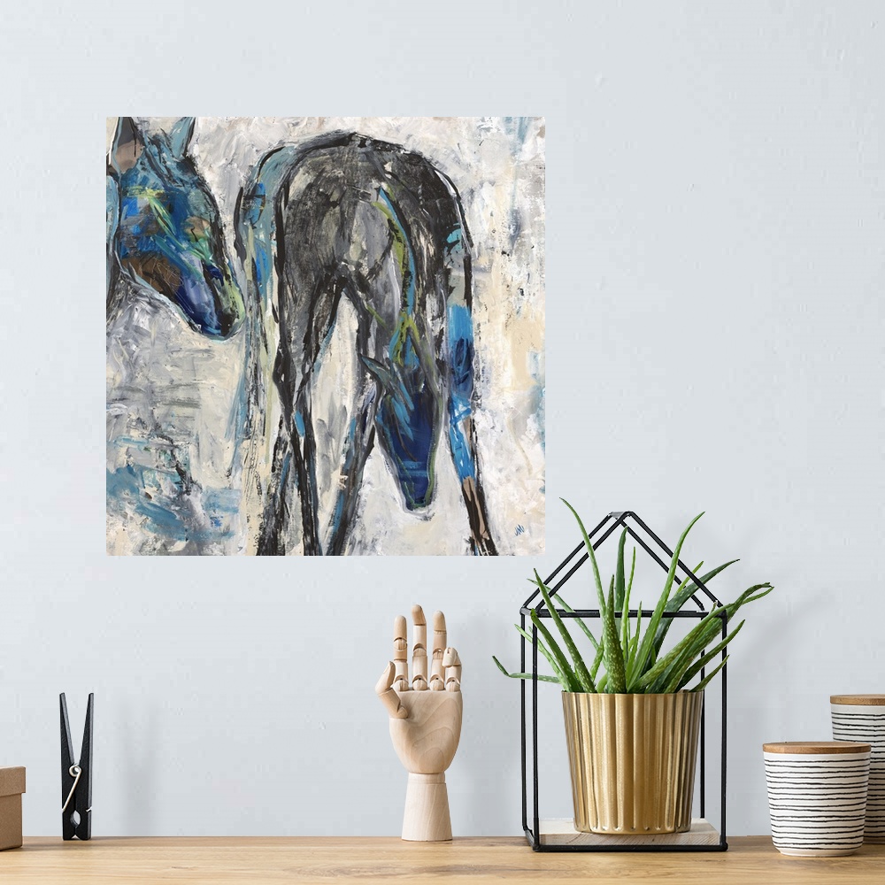 A bohemian room featuring Contemporary painting of two horses in shades of blue and black.