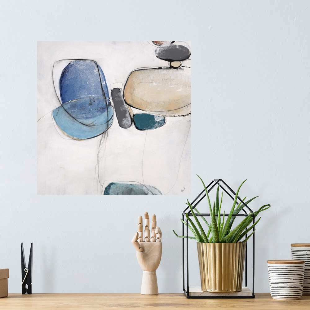 A bohemian room featuring Abstract painting of organic shapes in different colors, against a neutral background.