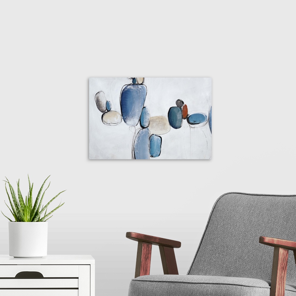 A modern room featuring Abstract painting using light blue to create shapes that look like rocks all balancing in air.