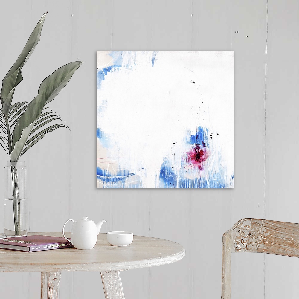 A farmhouse room featuring A contemporary abstract painting of a vibrant blue and red against a white background.