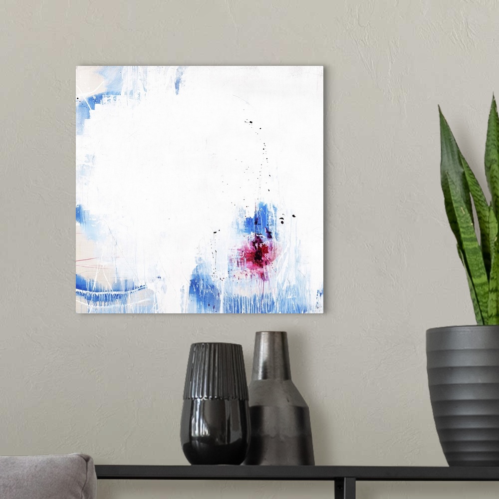 A modern room featuring A contemporary abstract painting of a vibrant blue and red against a white background.