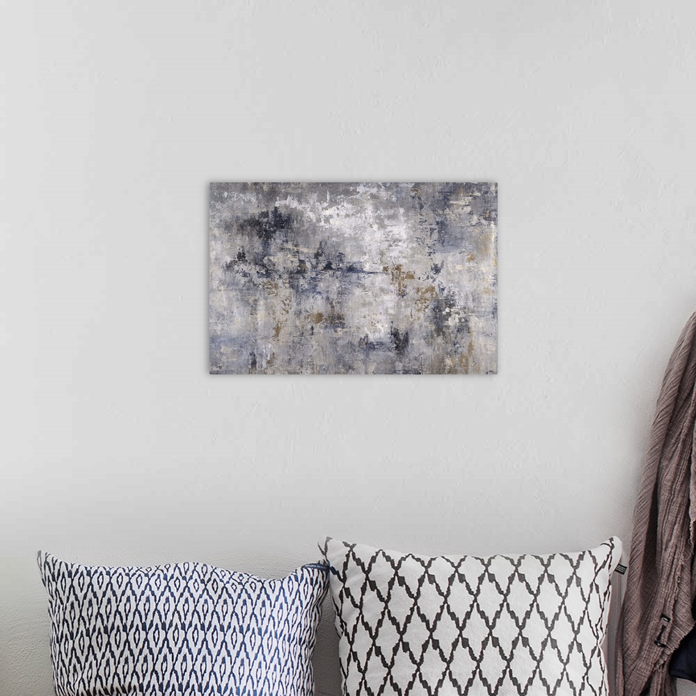 A bohemian room featuring Rough abstract artwork in shades of grey and brown.