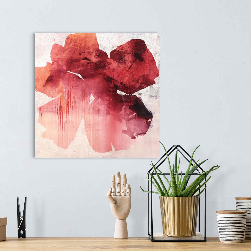 A bohemian room featuring Contemporary abstract painting using a vibrant and faded red against a neutral background.