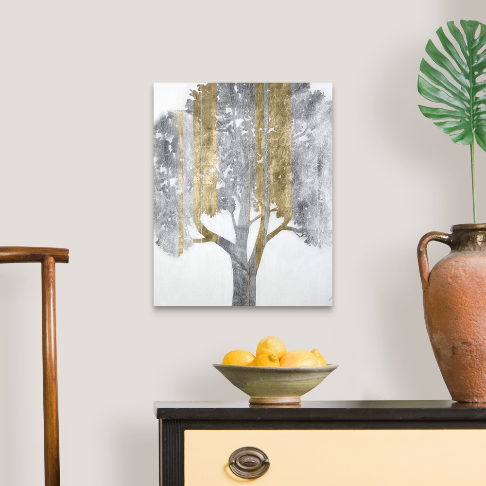 A traditional room featuring A modern painting of a single tree in silver with vertical streaks of gold.
