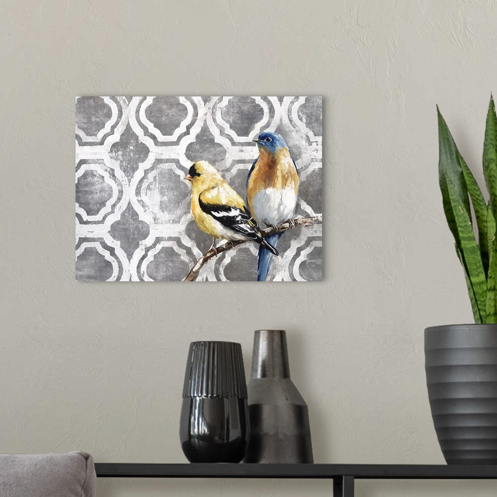 A modern room featuring Two birds perched on a small branch against a circular tile moroccan pattern.