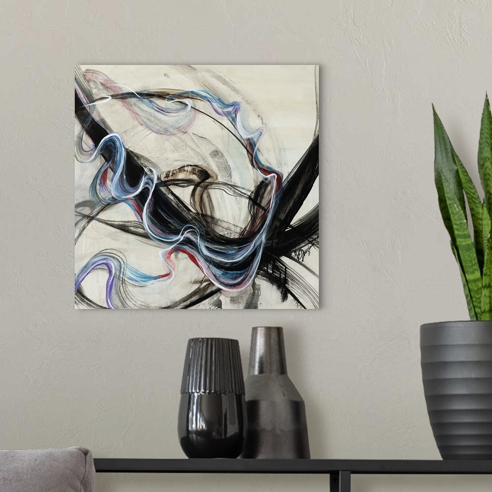 A modern room featuring Abstract artwork that has streaks of black paint across it and than a swirl of colors is painted ...