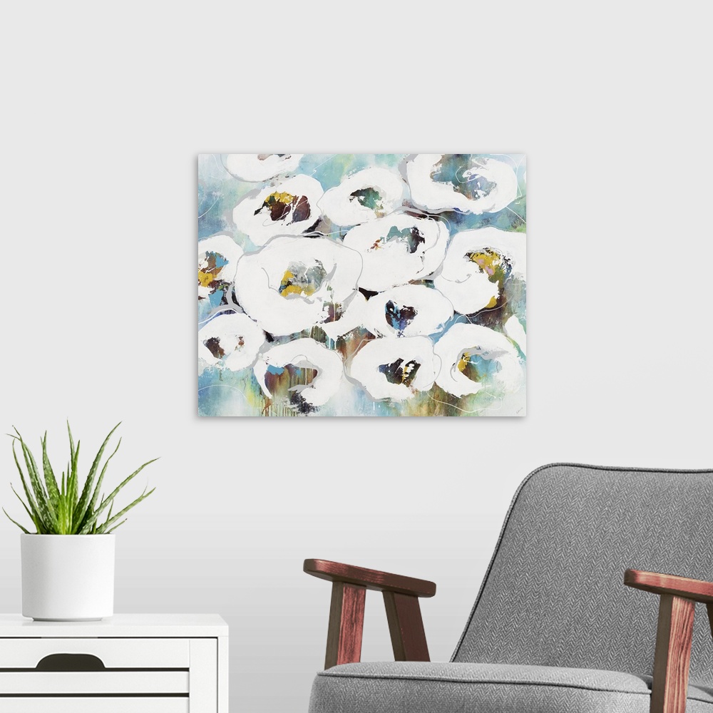 A modern room featuring An abstract floral painting of white flowers with a multi-color background.