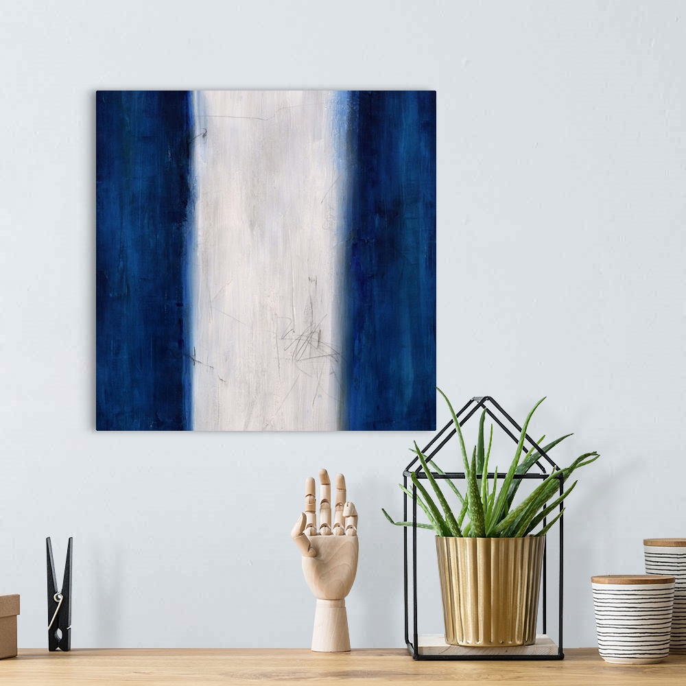 A bohemian room featuring Abstract painting using dark blue stripes on the left and right sides of the image, with a white ...
