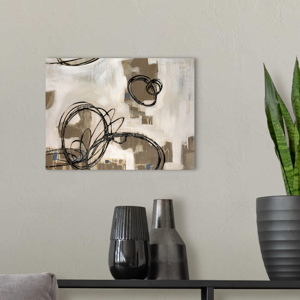 A modern room featuring Abstract canvas painting of patches of paint with circles scribbled on top.