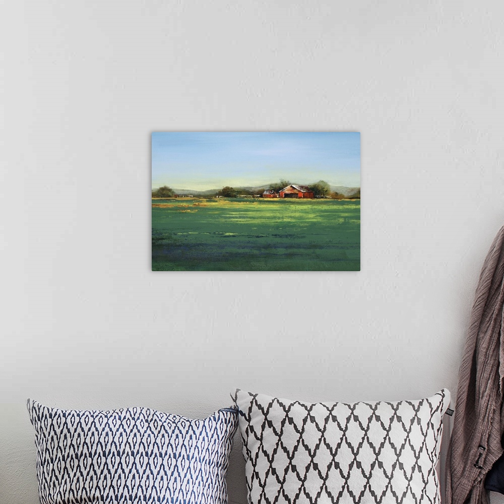 A bohemian room featuring Contemporary artwork of a farm landscape with a green field.