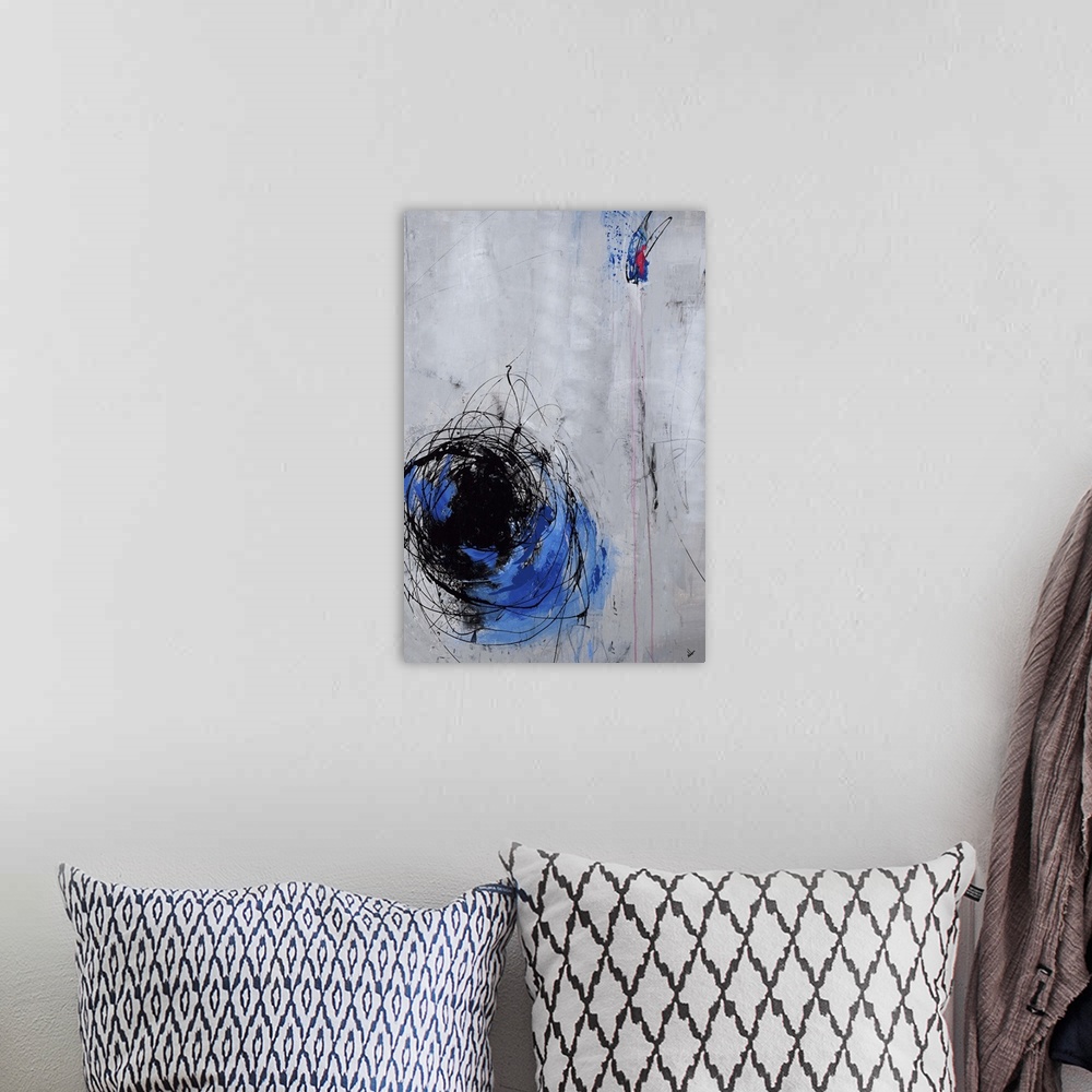 A bohemian room featuring Vertical abstract painting with a grey background, blue swirl on the bottom left side with thin b...