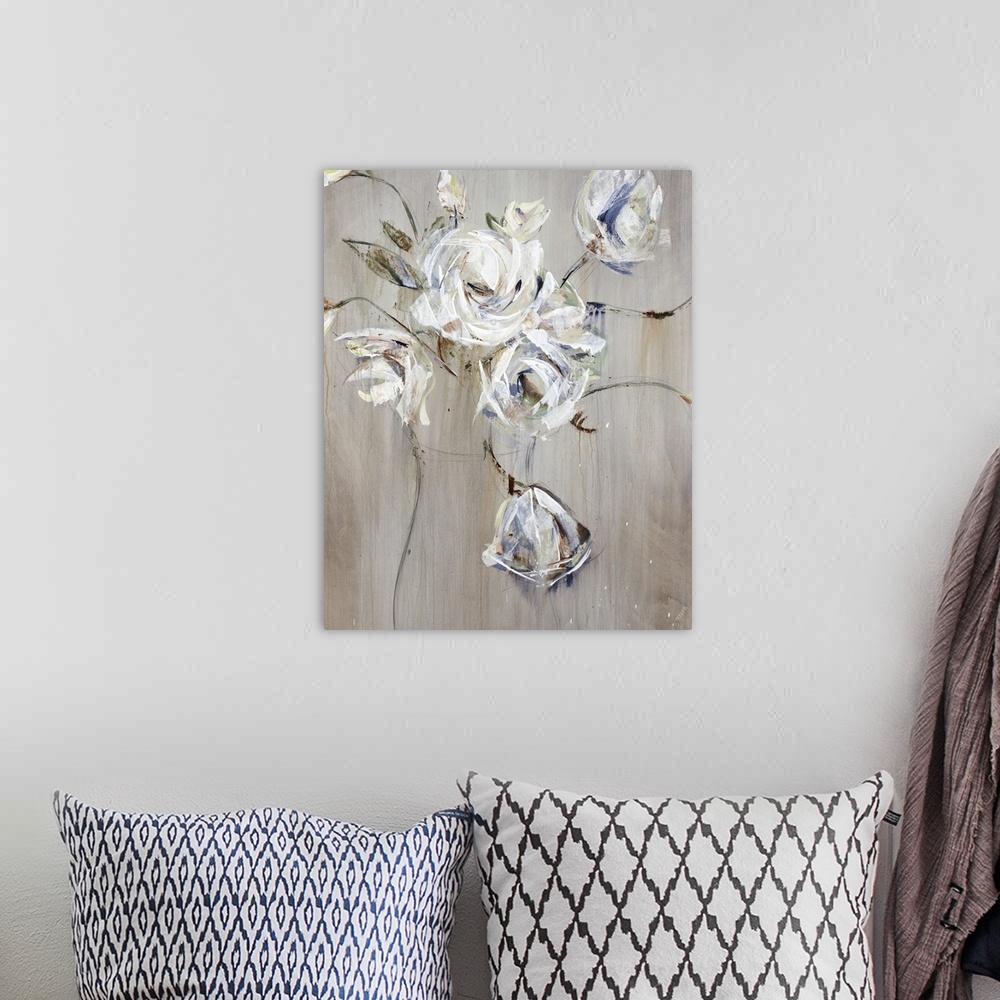 A bohemian room featuring A textured painting of an arrangement of white flowers in a vase.