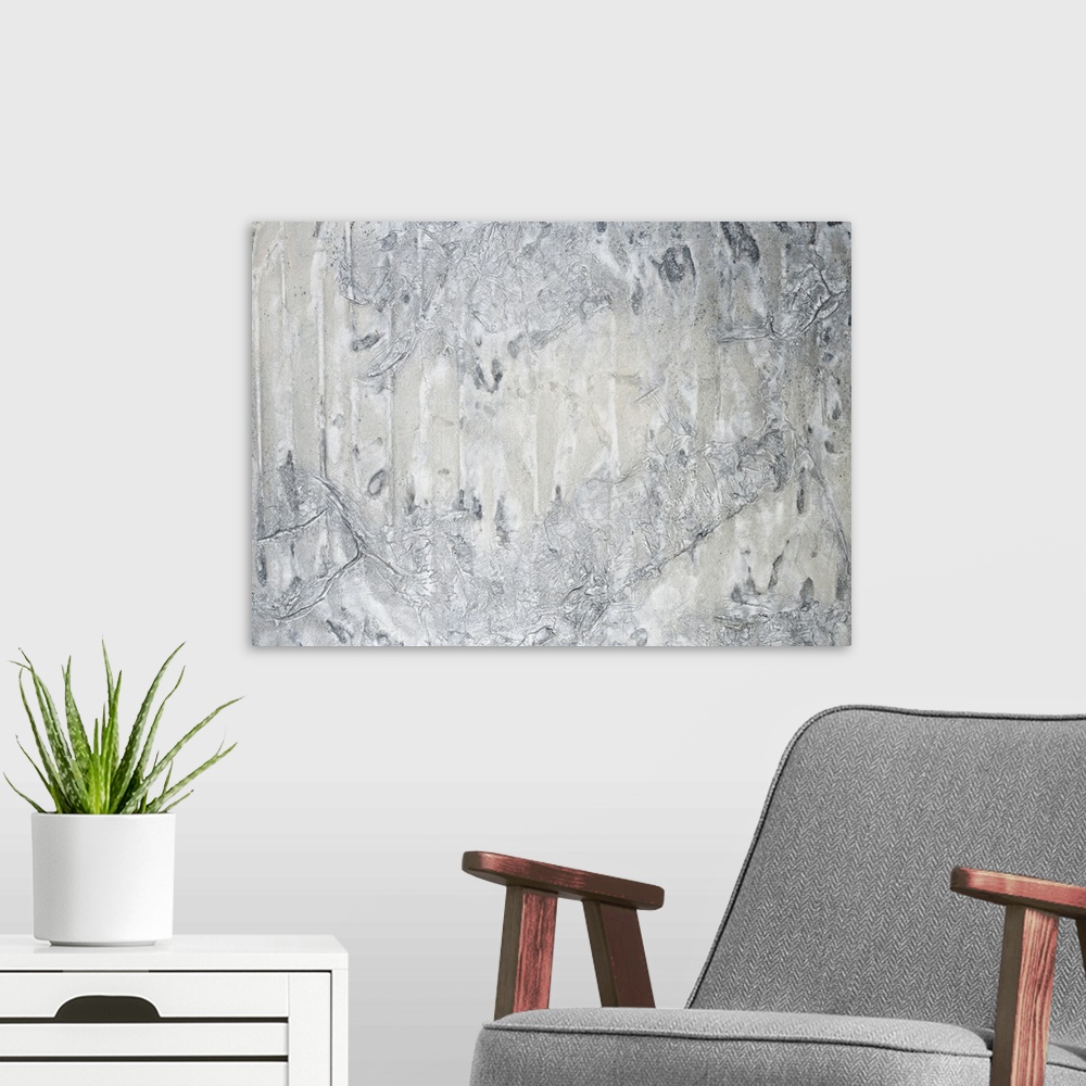 A modern room featuring A contemporary abstract painting using neutral tones in textural forms.