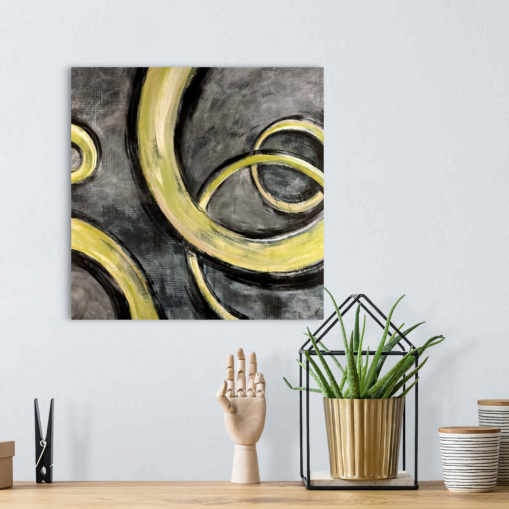 A bohemian room featuring Square contemporary painting of yellow swirls moving along a textured gray background, evoking a ...