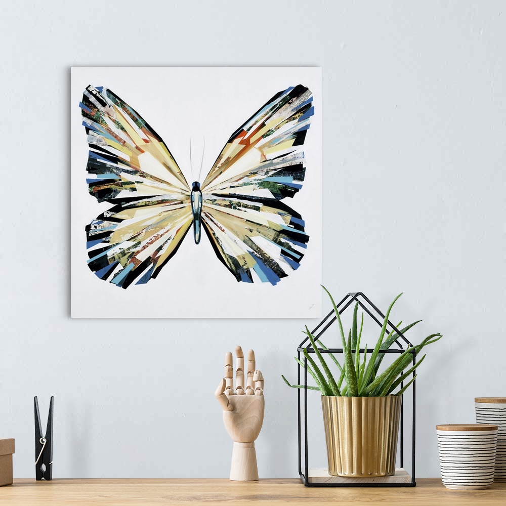 A bohemian room featuring Colorful painting of a butterfly done in a collage style.