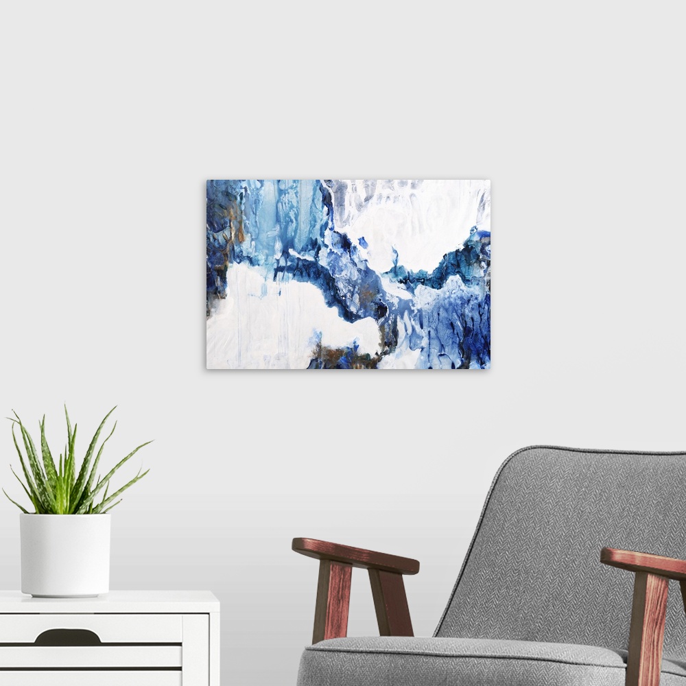 A modern room featuring Large abstract painting in shades of blue with some brown mixed in and white throughout.