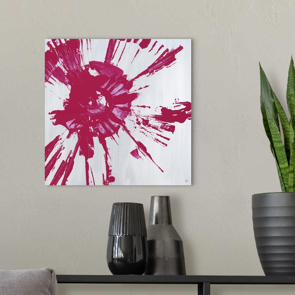A modern room featuring Square abstract painting with a pink circular splatter design on a gray background.
