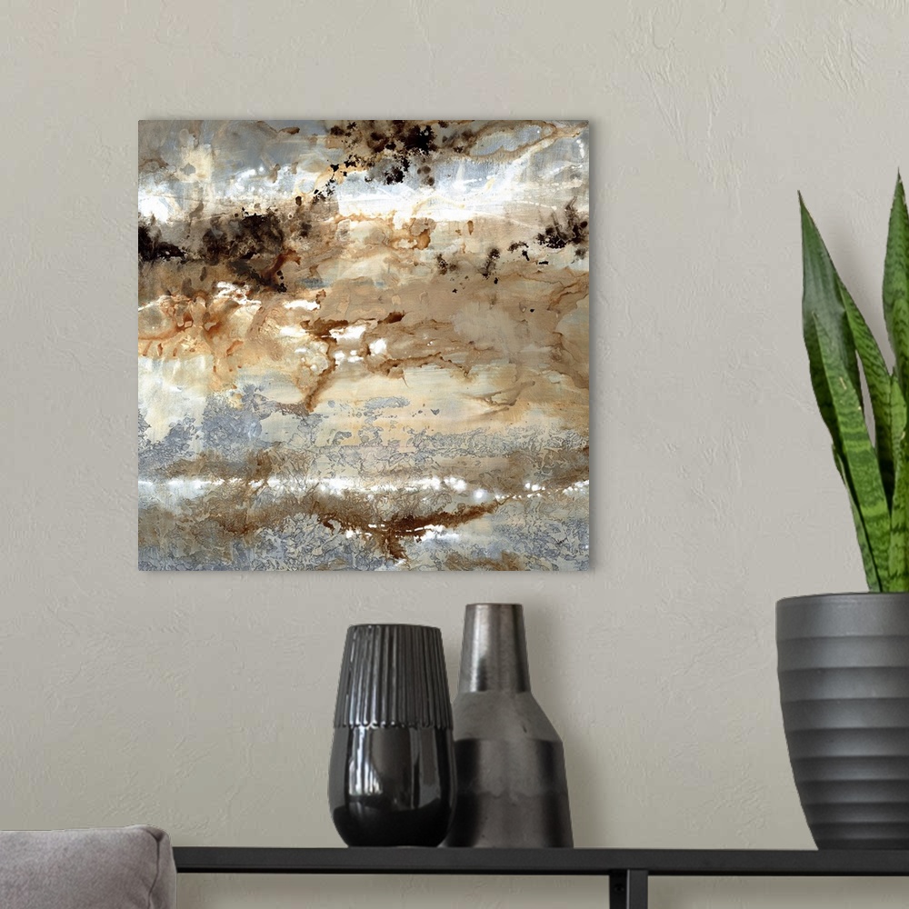A modern room featuring Square abstract art with silver, brown, black, and white hues.