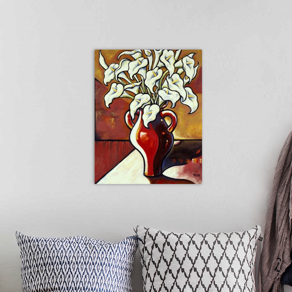 A bohemian room featuring A painting of a large bouquet of white lilies in a large red vase.