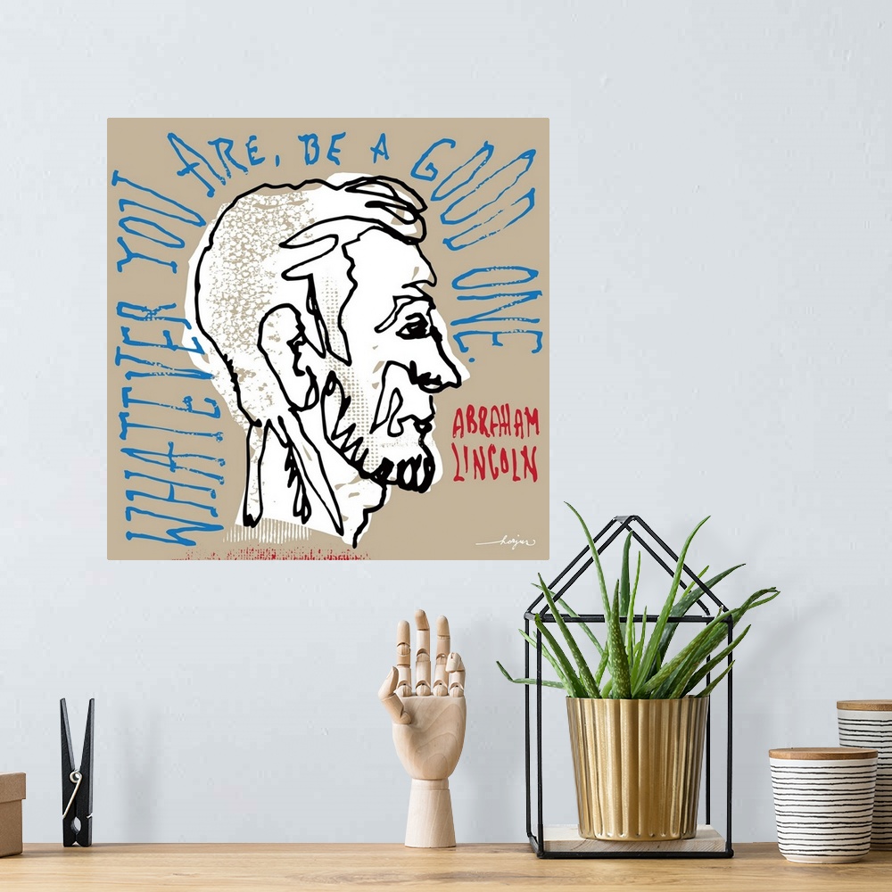A bohemian room featuring Profile pen and ink illustration of Abe Lincoln with a quote by Abe Lincoln.