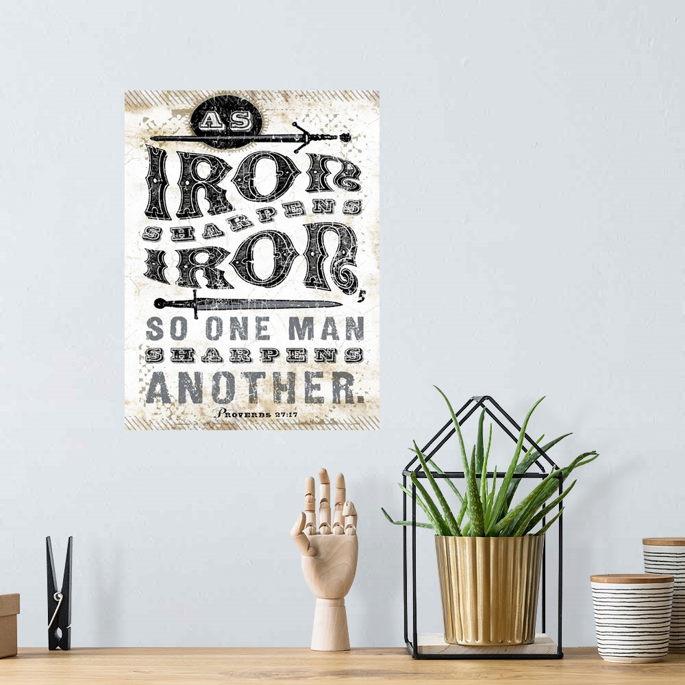 A bohemian room featuring Distressed lettering of the scripture bible verse Proverbs 27:17 As iron sharpens iron, so one ma...