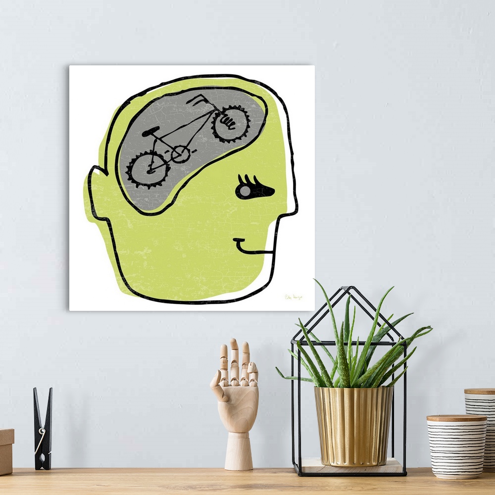 A bohemian room featuring Line drawing of a persons head with a bike inside of his brain called bike on the Brain.