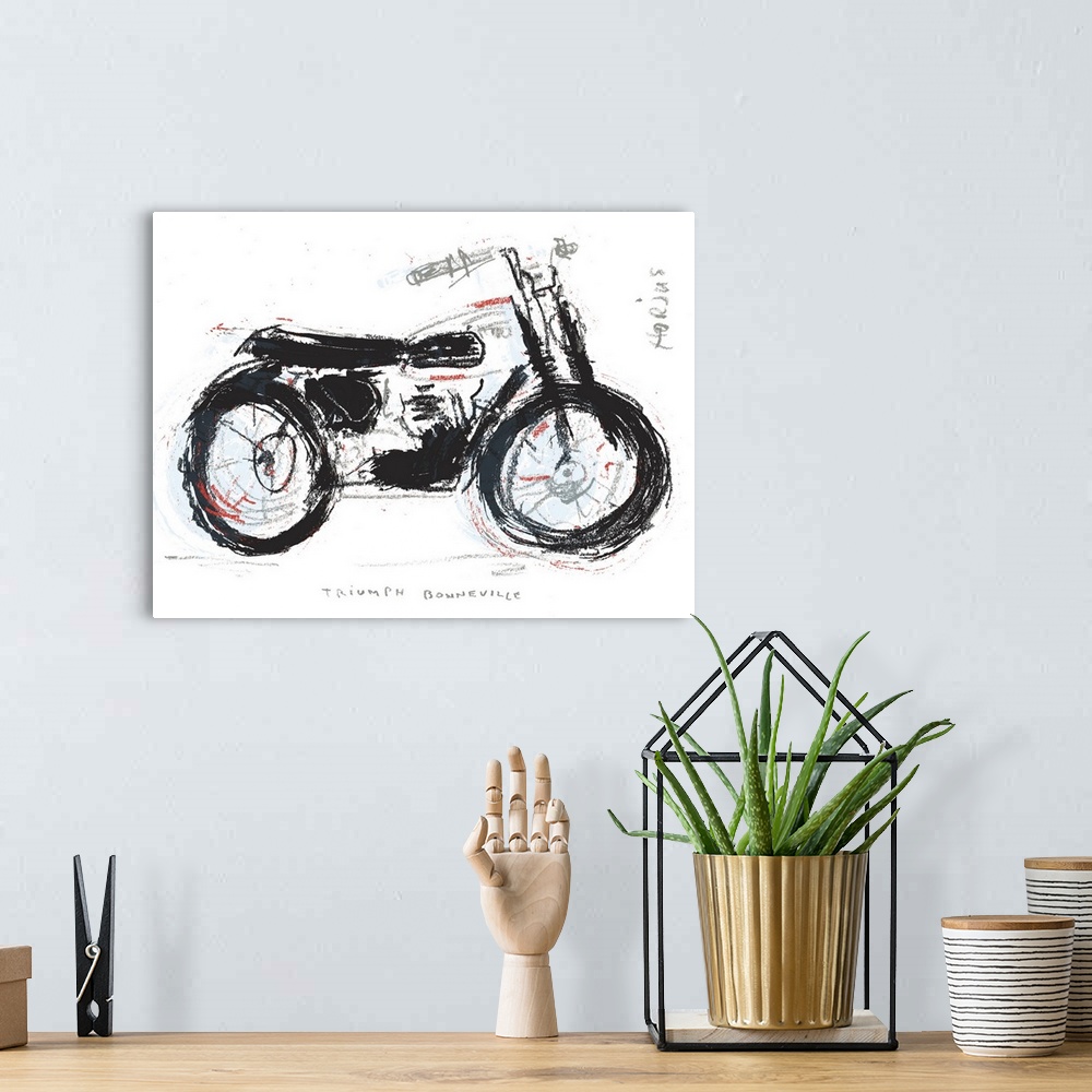 A bohemian room featuring Mixed media artwork of a vintage motorcycle.