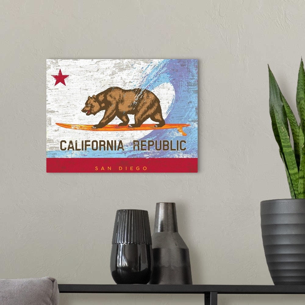 A modern room featuring Wall art of the California state bear flag with the bear surfing on a surfboard with wave behind ...
