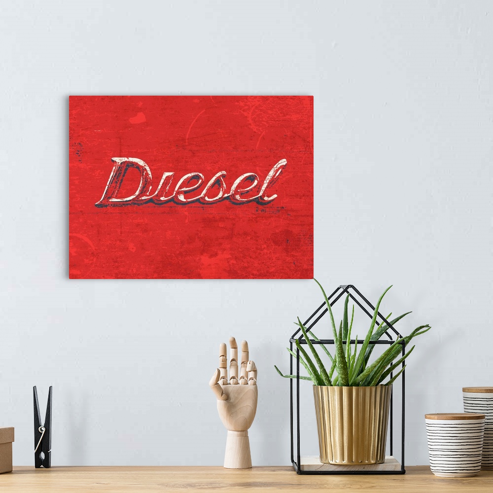 A bohemian room featuring Graphic rusty wall art of distressed typography with the the word DIESEL large and in center on a...